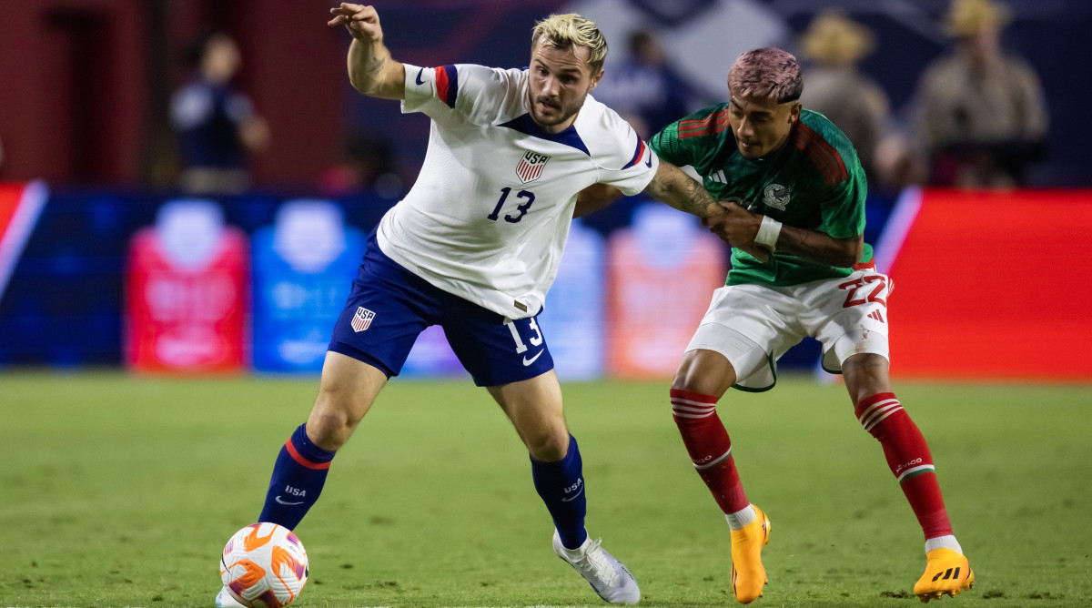 Jordan Morris playing against Julian Araujo.